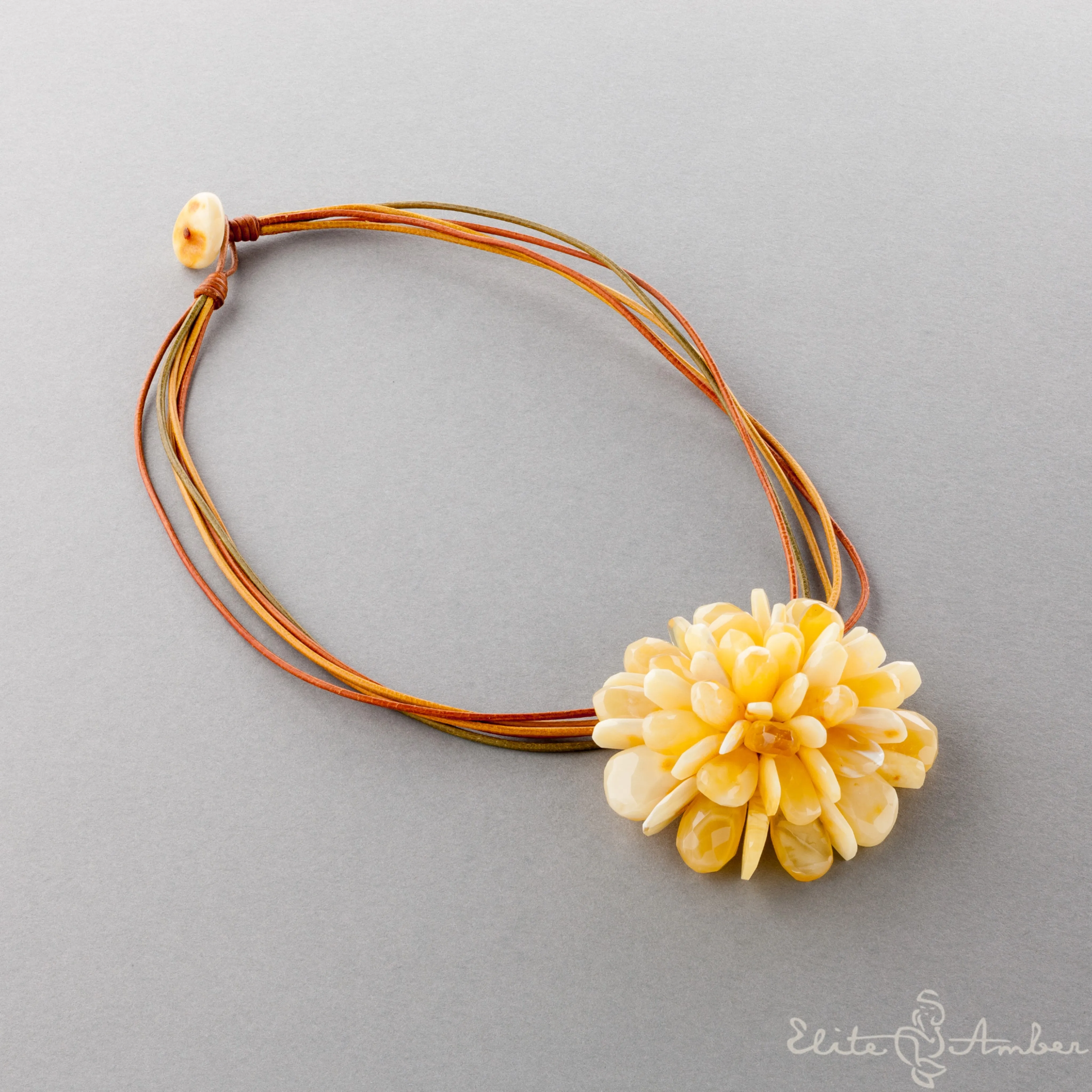 Amber brooch-pendant "Royal white flower"