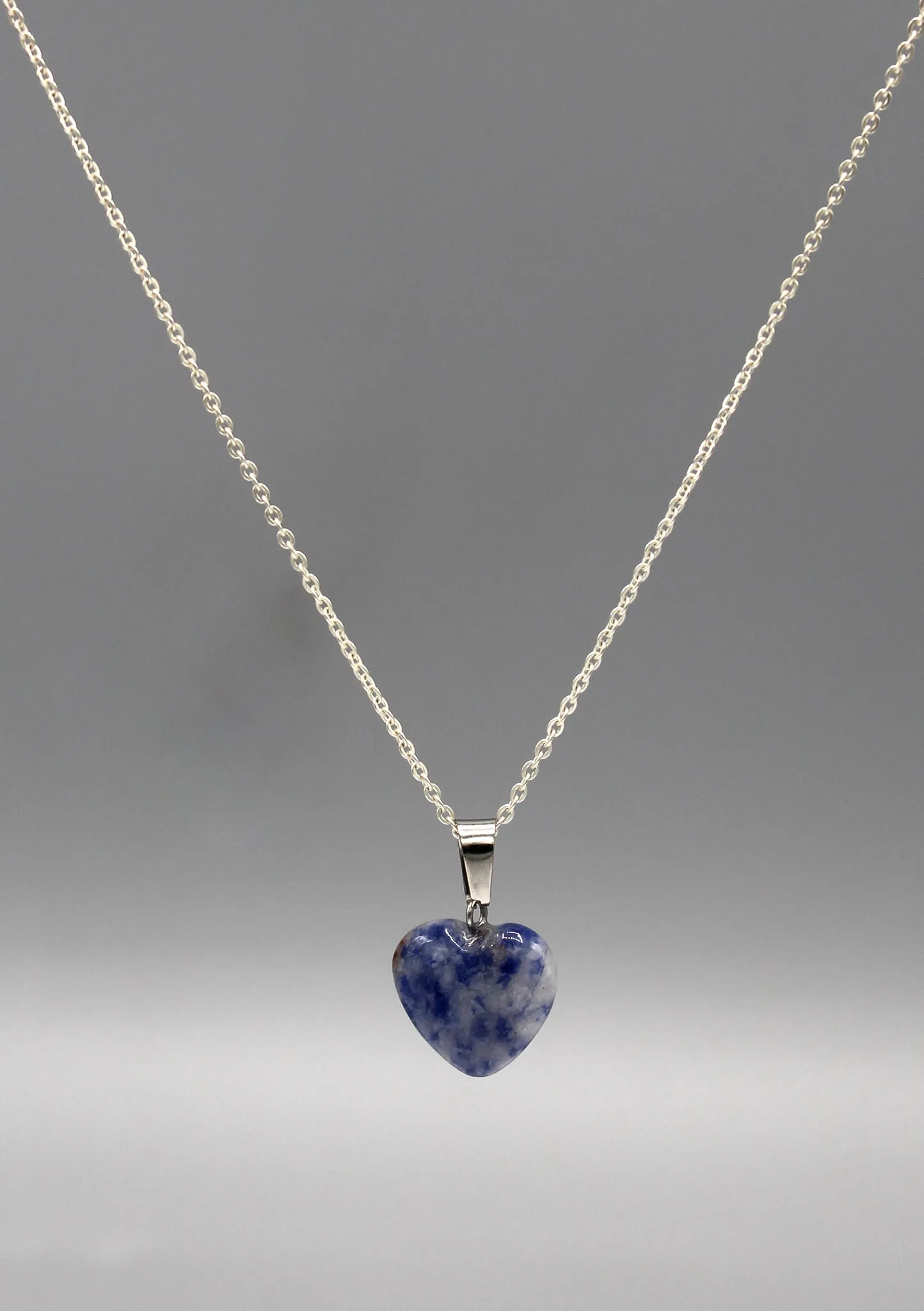 Elegant White and Blue Lapis Heart Pendant