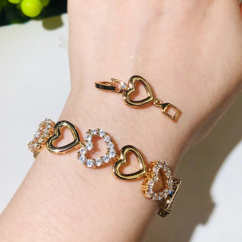 Hearts all Around Cubic Zirconia Gold or Silver Tone Bracelet