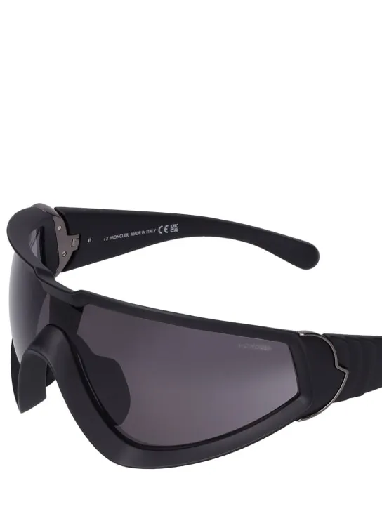 Moncler   Wrapid futuristic shape sunglasses 