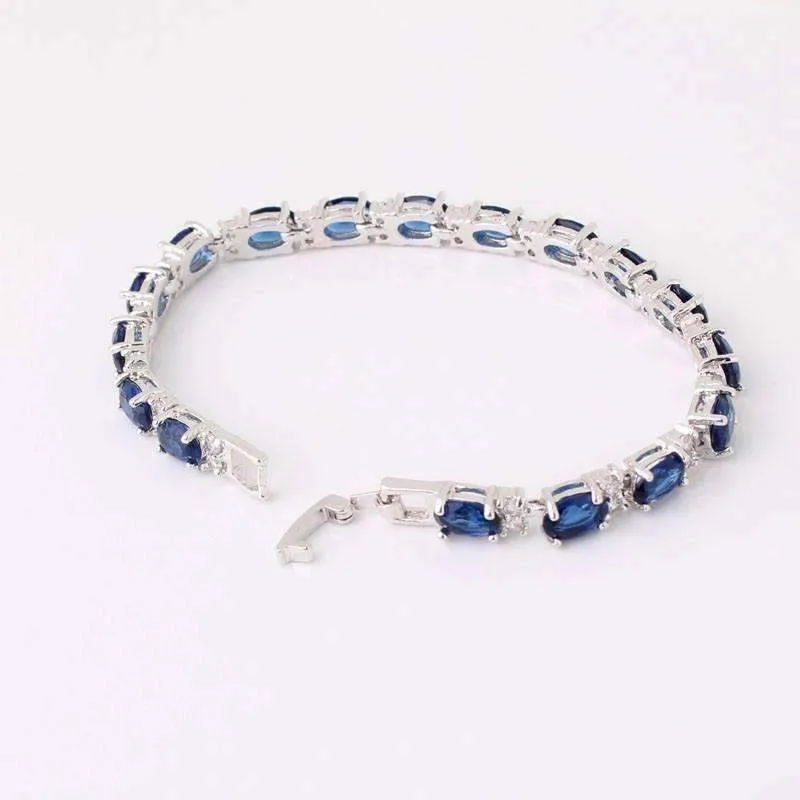 Sapphire Blue Oval Austrian Crystal Tennis Bracelet in 14K White Gold for Women