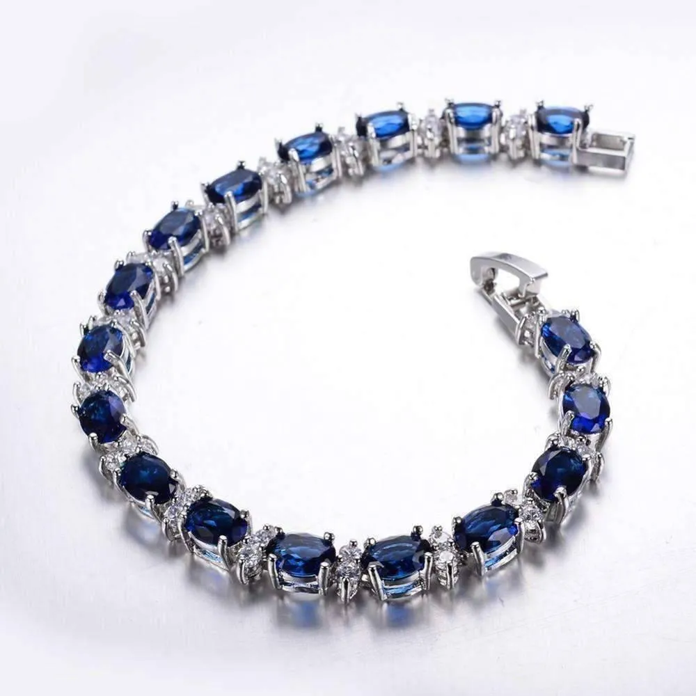 Sapphire Blue Oval Austrian Crystal Tennis Bracelet in 14K White Gold for Women