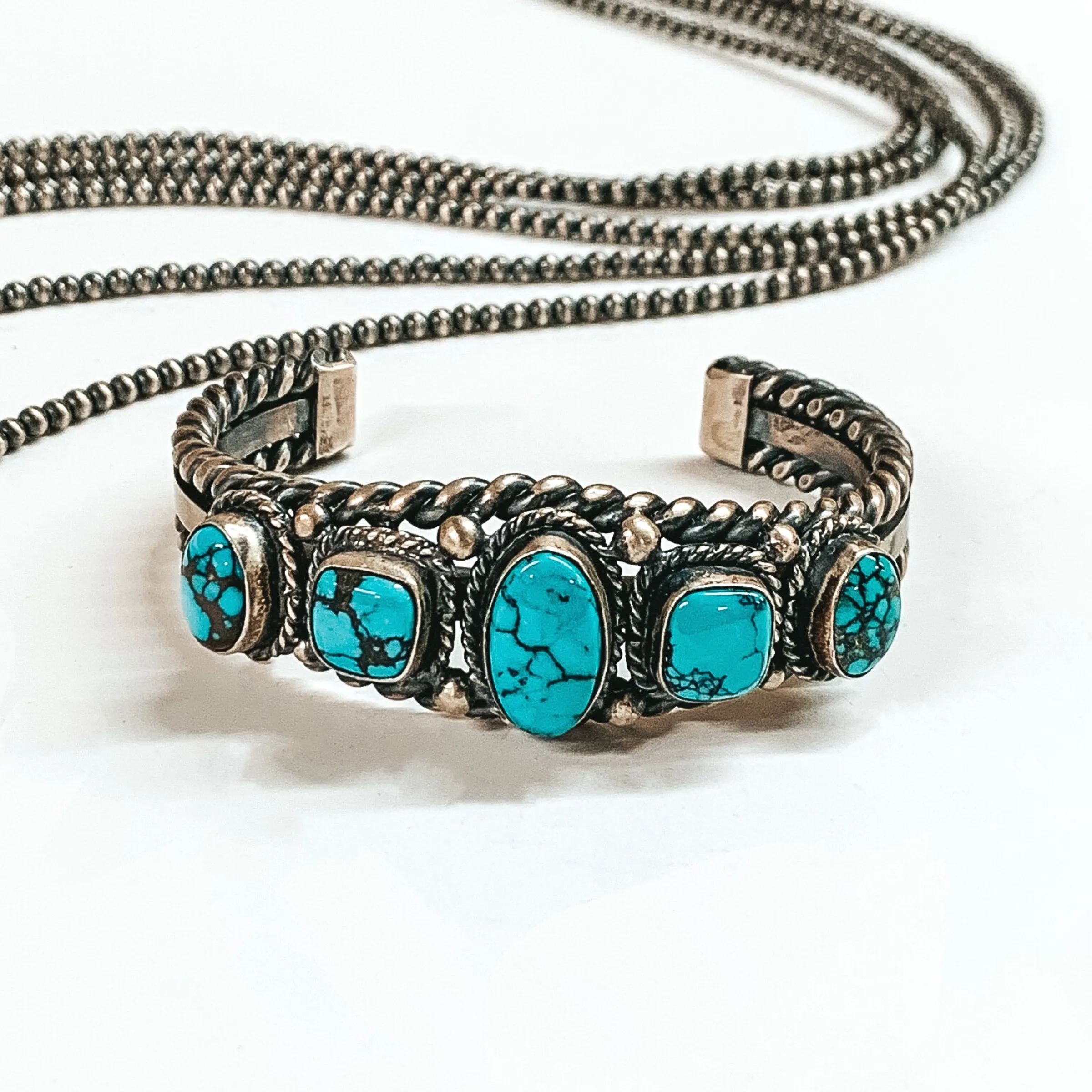 Tom Shirley | Navajo Handmade Sterling Silver Cuff with Five Turquoise Stones